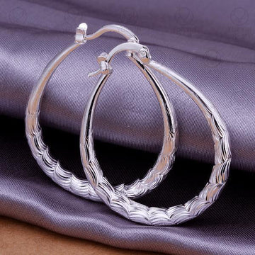 High Quality Fashion Silver Plated Elliptical Fish Ripple Hoop Earrings - The Jewellery Supermarket